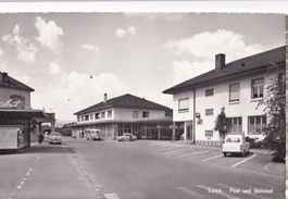 Lyss Post und Bahnhof Postauto und alte Autos