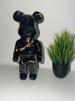 Designer-Bär in Schwarz-Gold-Marmoroptik