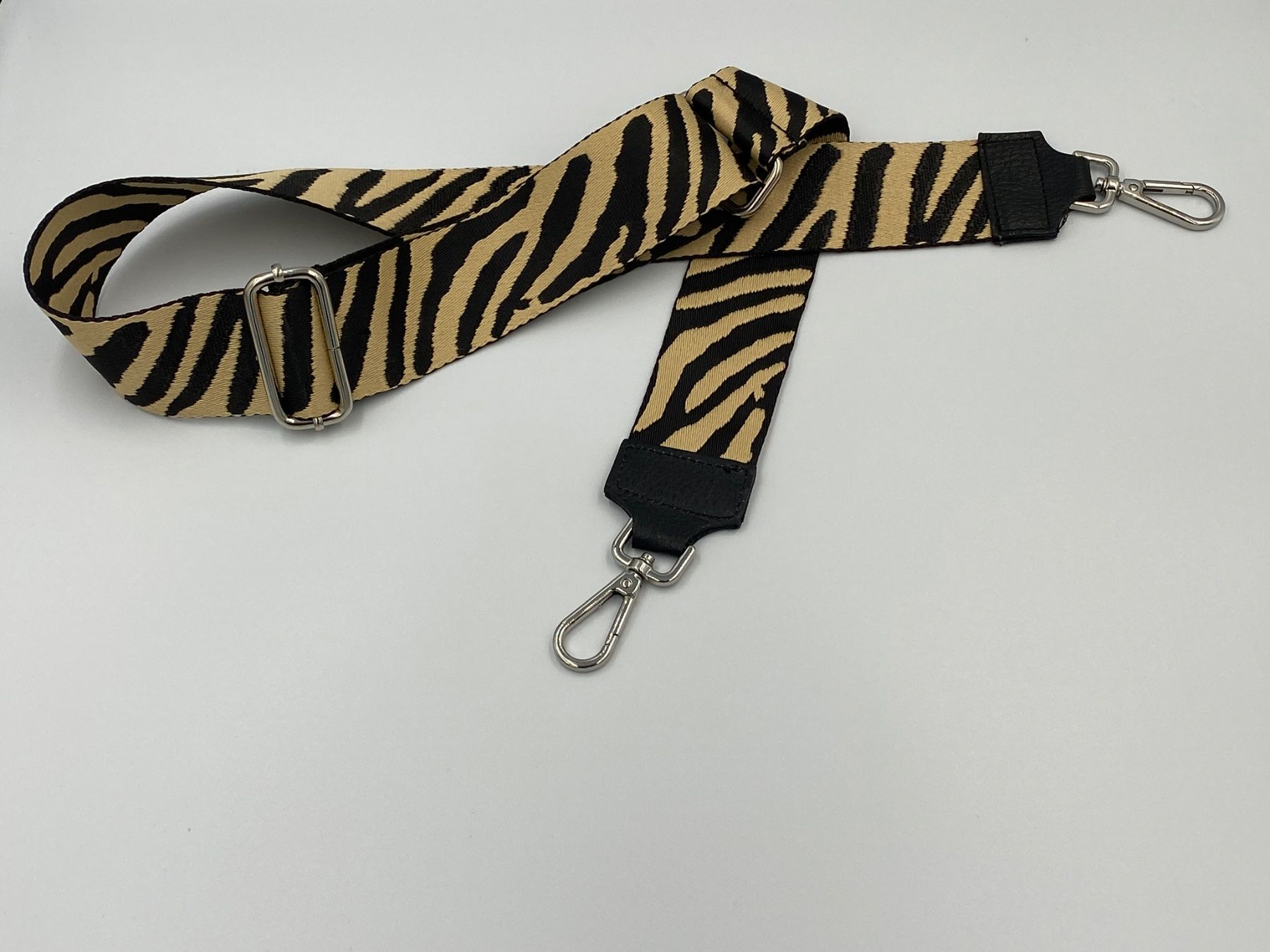 Altro in  Abbigliamento & Accessori: Schulterriemen "Zebra Schwarz" – Nuovo e nell'imballaggio originale da Bülach venduto da DuffyFashionAvenue