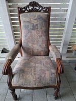 Antiker Armlehnstuhl Holz mit Stoffbezug gebrauchter Zustand