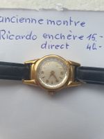 Montre ancienne pour femme fond acier état correct