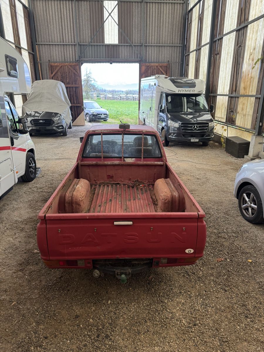 Datsun Autos: Datsun 720 Pickup – Defekt aus Widen von SaschaSuter 1