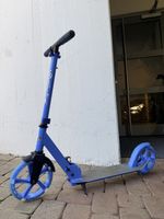 Kinder Trotti mit großen leuchtenden Rollen, gut erhalten