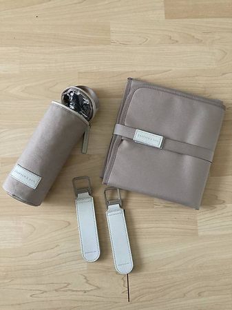 Wickelunterlage, Rucksackhalterung, Milchwärmebehälter