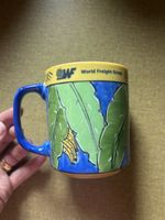 Tasse avec motif feuilles et bananes