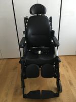 Pflegerollstuhl mit zus. Schiebehilfe