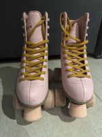 Rosa Rollschuhe 