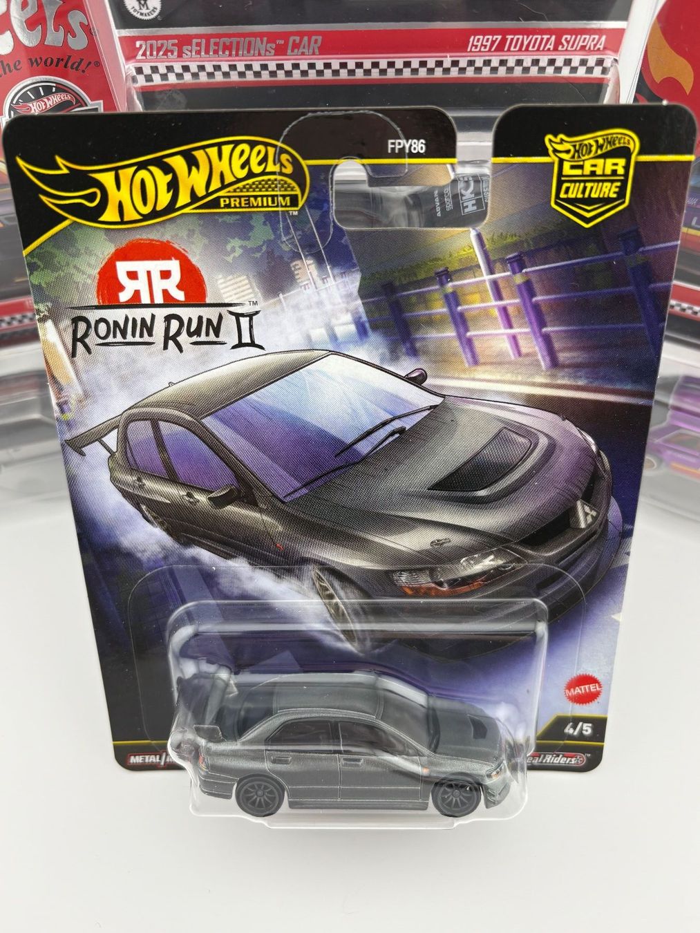 Hot Wheels Modellini d'auto: Hot Wheels Mitsubishi Lancer Evolution IX Ronin Run II 2025 – Nuovo e nell'imballaggio originale da Flawil venduto da HeisseReifen 1