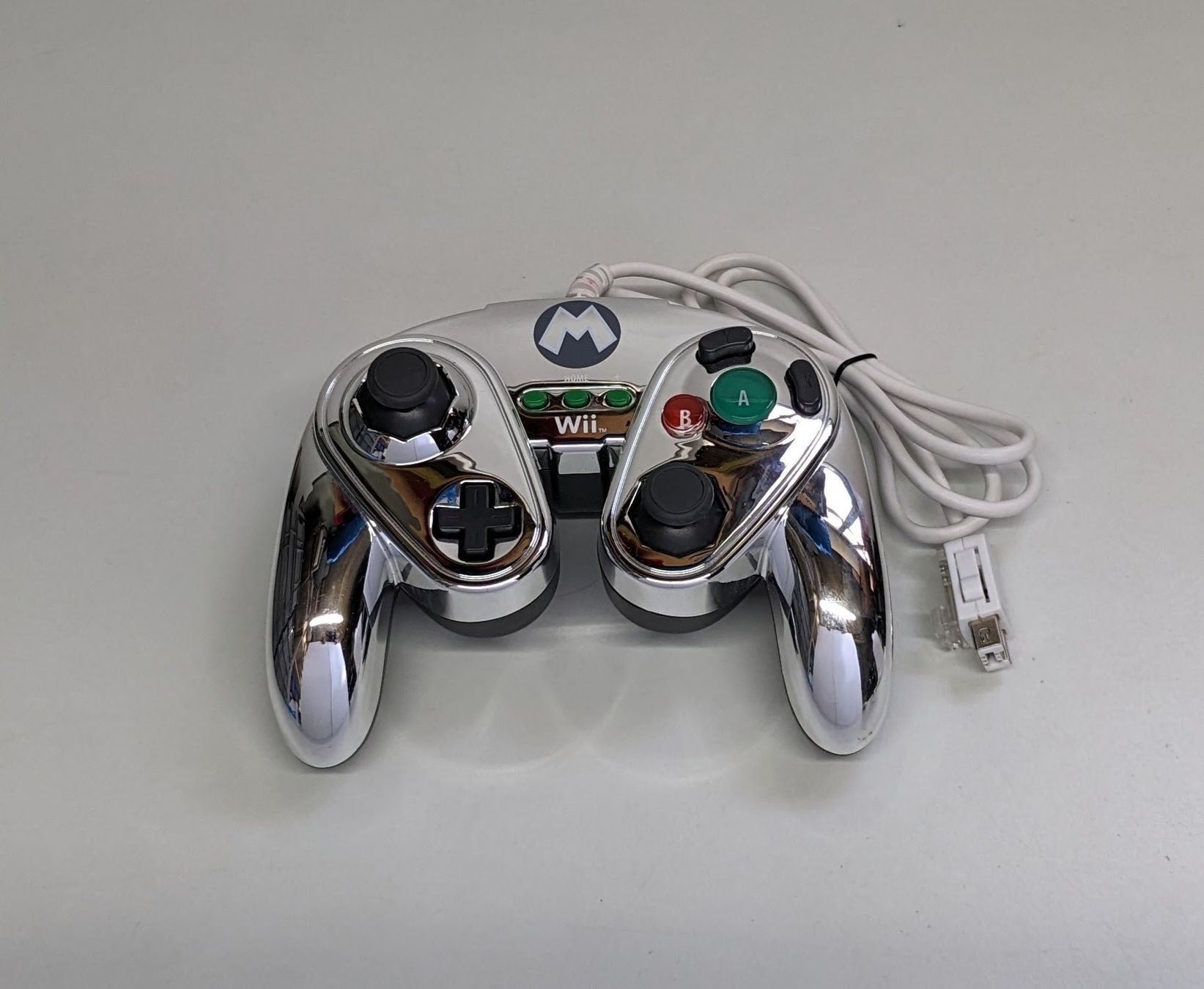 Controller: Wii Gamecube-Controller Mario, metallic-silber – Gebraucht aus Menziken von