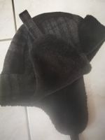 Bonnet à oreillettes tombantes