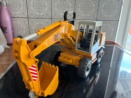 Spielzeugbagger Liebherr 912 guter Zustand