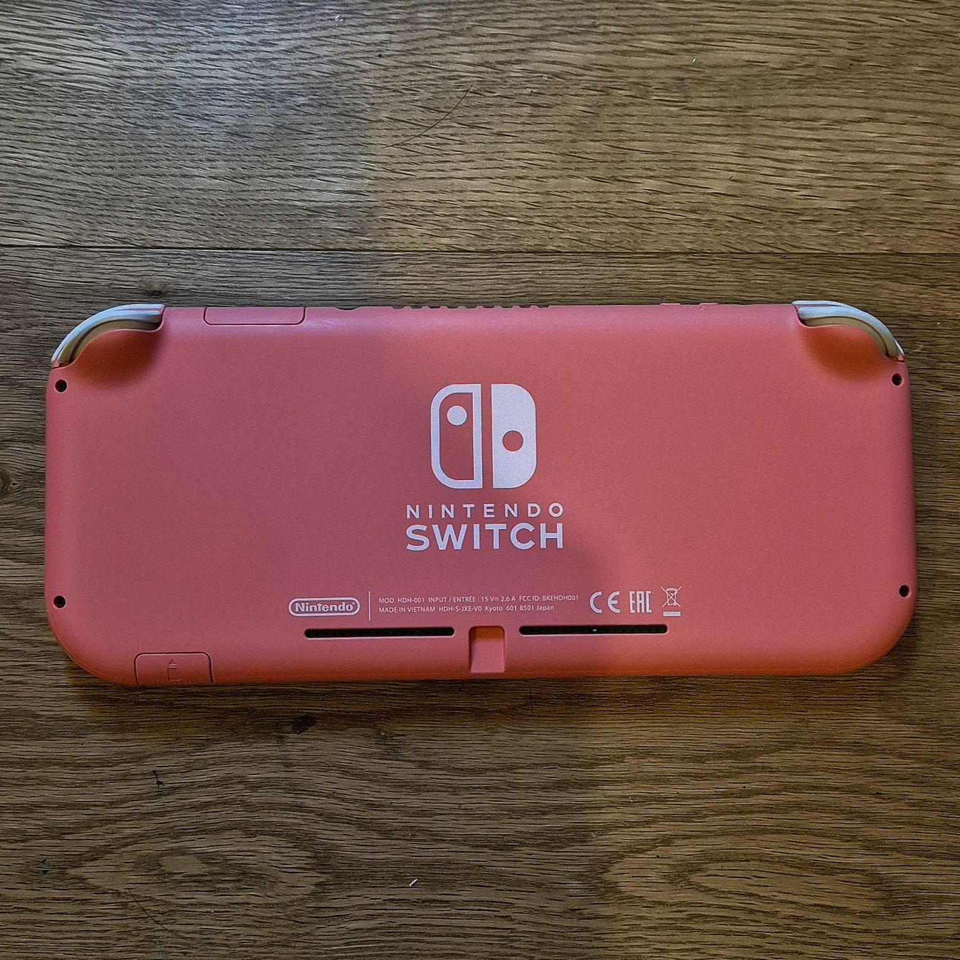 Nintendo Console: Nintendo Switch Lite console corail en bon état – Nuovo (secondo la descrizione) da Muraz (Collombey) venduto da let_mwf2 1