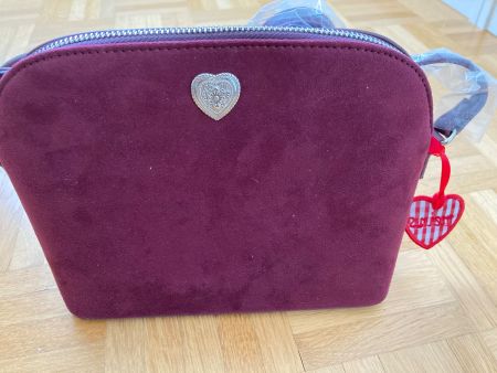 Bordeauxrote, kleine Handtaschen im Trachtenstil