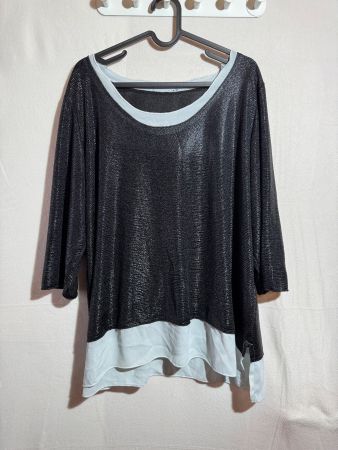 Schöne glänzende Bluse Gr. 44