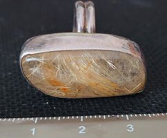 Silberring mit einem Bernstein ähnlichen Stein // 11.4 gr