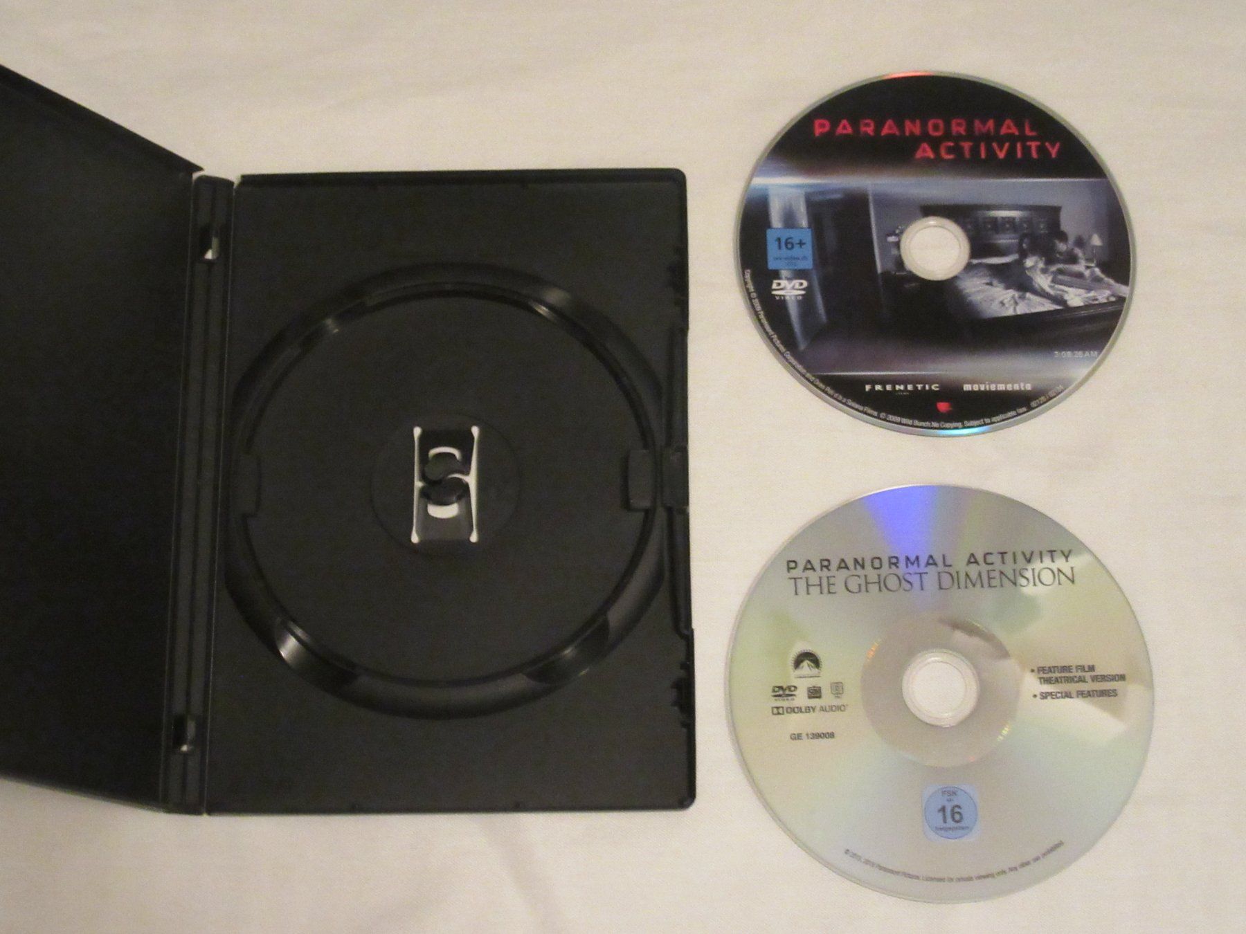 Tutti i DVDs: Paranormal Activity 5- Ghost Dimension DVD + Teil 1 Gratis – Usato da Bern venduto da Mariana7 2