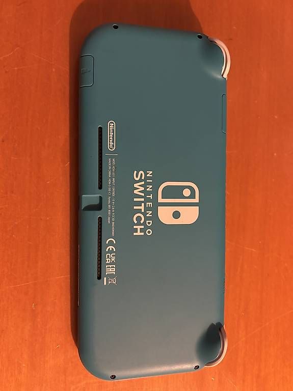 Consoles: Nintendo Switch Light Turchese – D'occasion à Viganello par 597_k72f 1