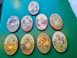 9 oval wooden plates with seasonal motifs vintage