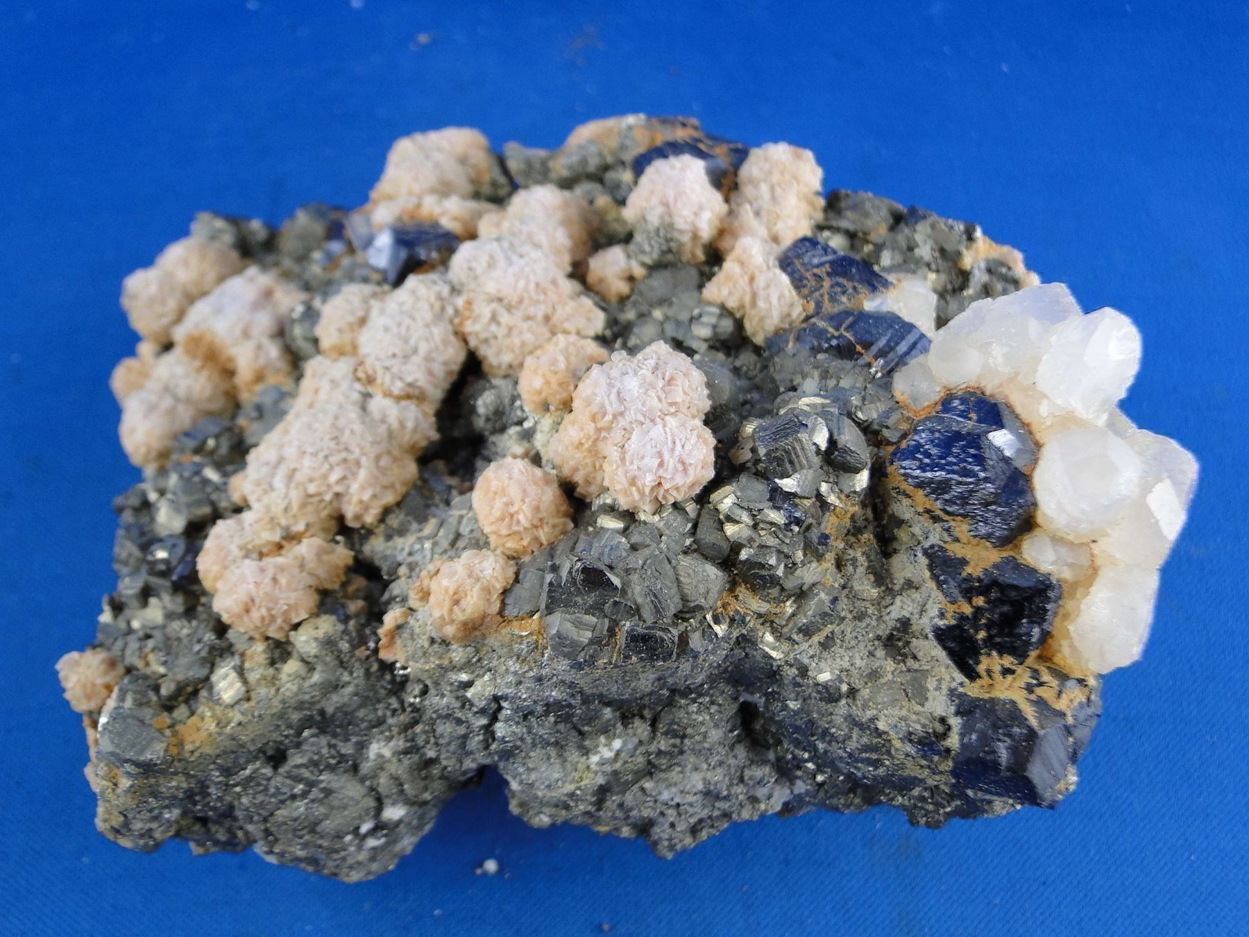 Minerali & Pietre curative: Rhodochrosit mit Sphalerit und Pyrit – Usato da Schinznach Bad venduto da Demerald 7