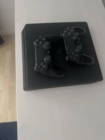 Sony PlayStation 4 Slim Konsole mit 2 Controllern