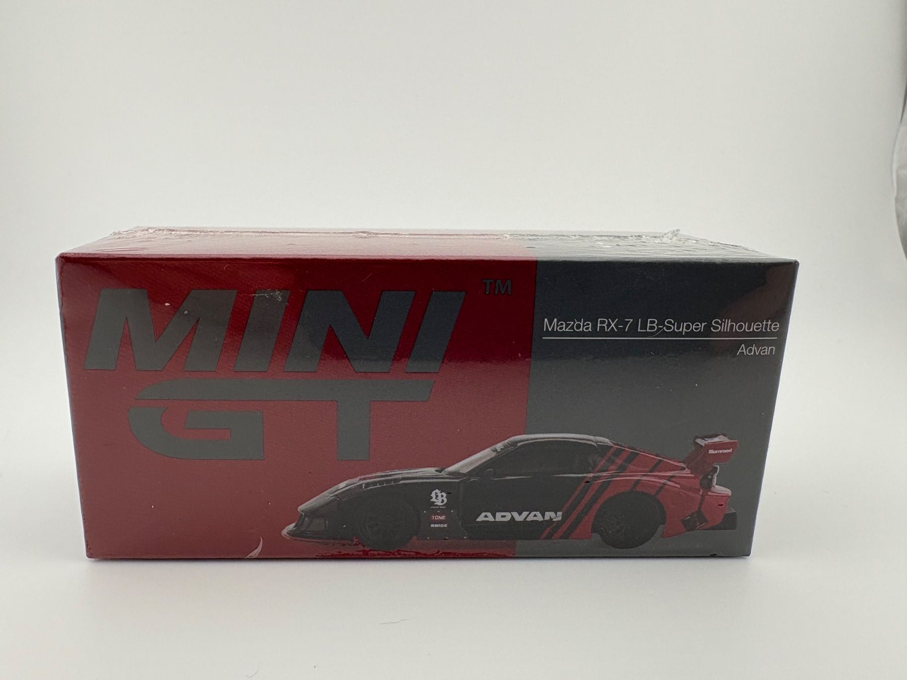 Hot Wheels Modellini d'auto: Mini GT Mazda RX-7 LB-Super Silhouette Advan - 983 – Nuovo e nell'imballaggio originale da Flawil venduto da HeisseReifen 2