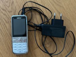 Mobiltelefon Nokia C5 mit Ladegerät gebraucht</div>