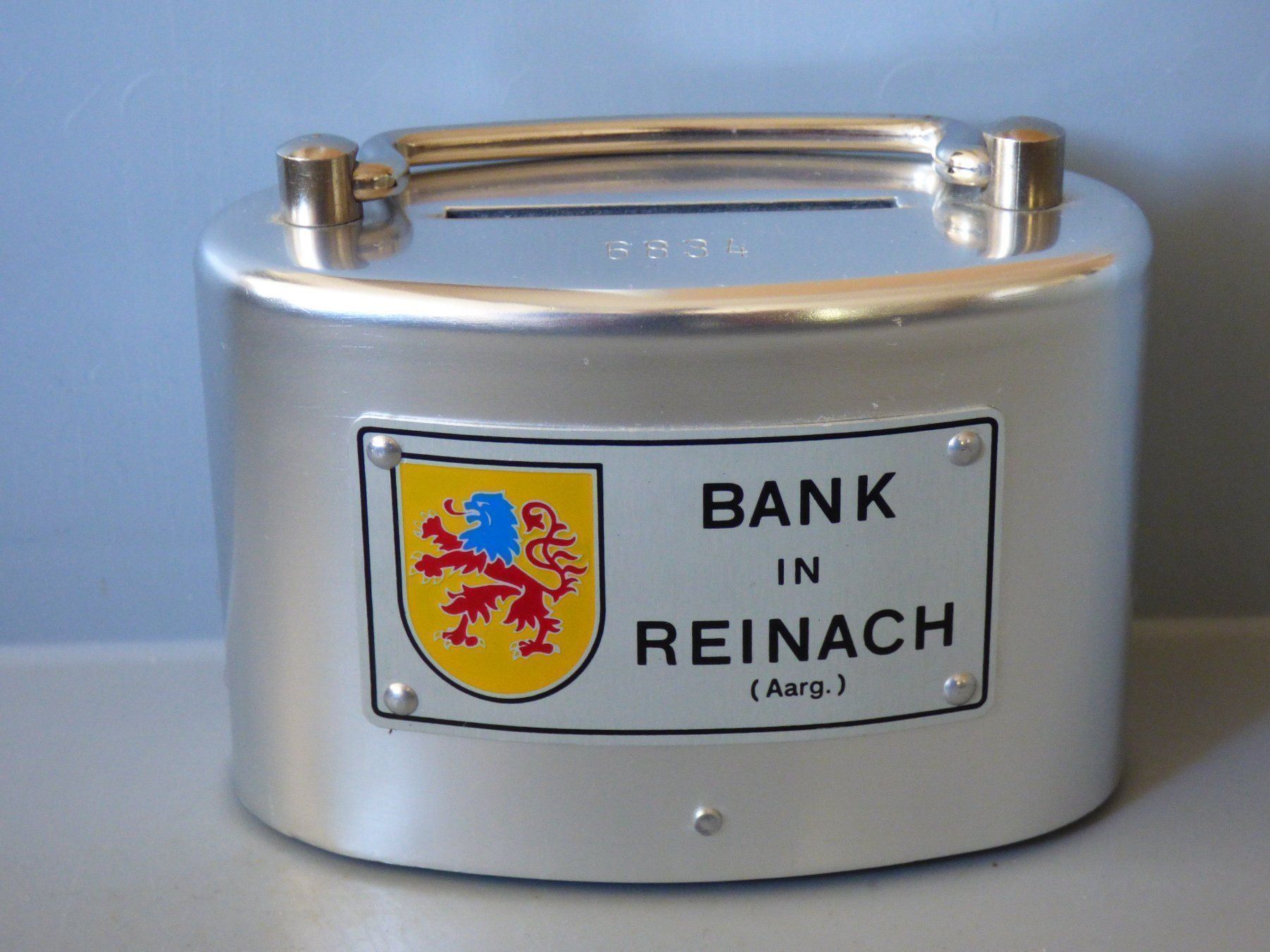 Spardosen: Kässeli, Bank in Reinach – Gebraucht aus Zürich von Goulliver