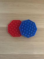 Pop It Spielzeug 2 Stk. rot und blau