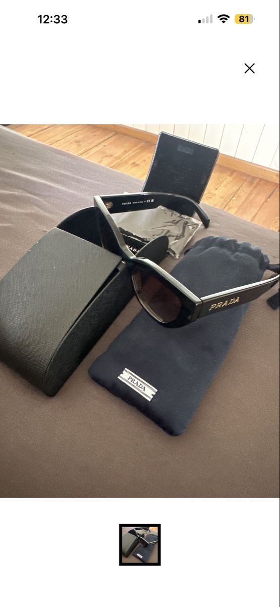 Prada Occhiali & Lenti: Sonnenbrille Prada Damen Schwarz mit Etui  – Usato da Henggart venduto da jan_p56w