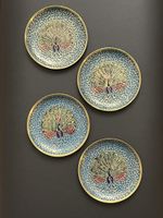 4 petits plats décoratifs en laiton motif paon état neuf