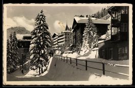 AK Arosa, Ortspartie mit Hotel Des Alpes im Winter