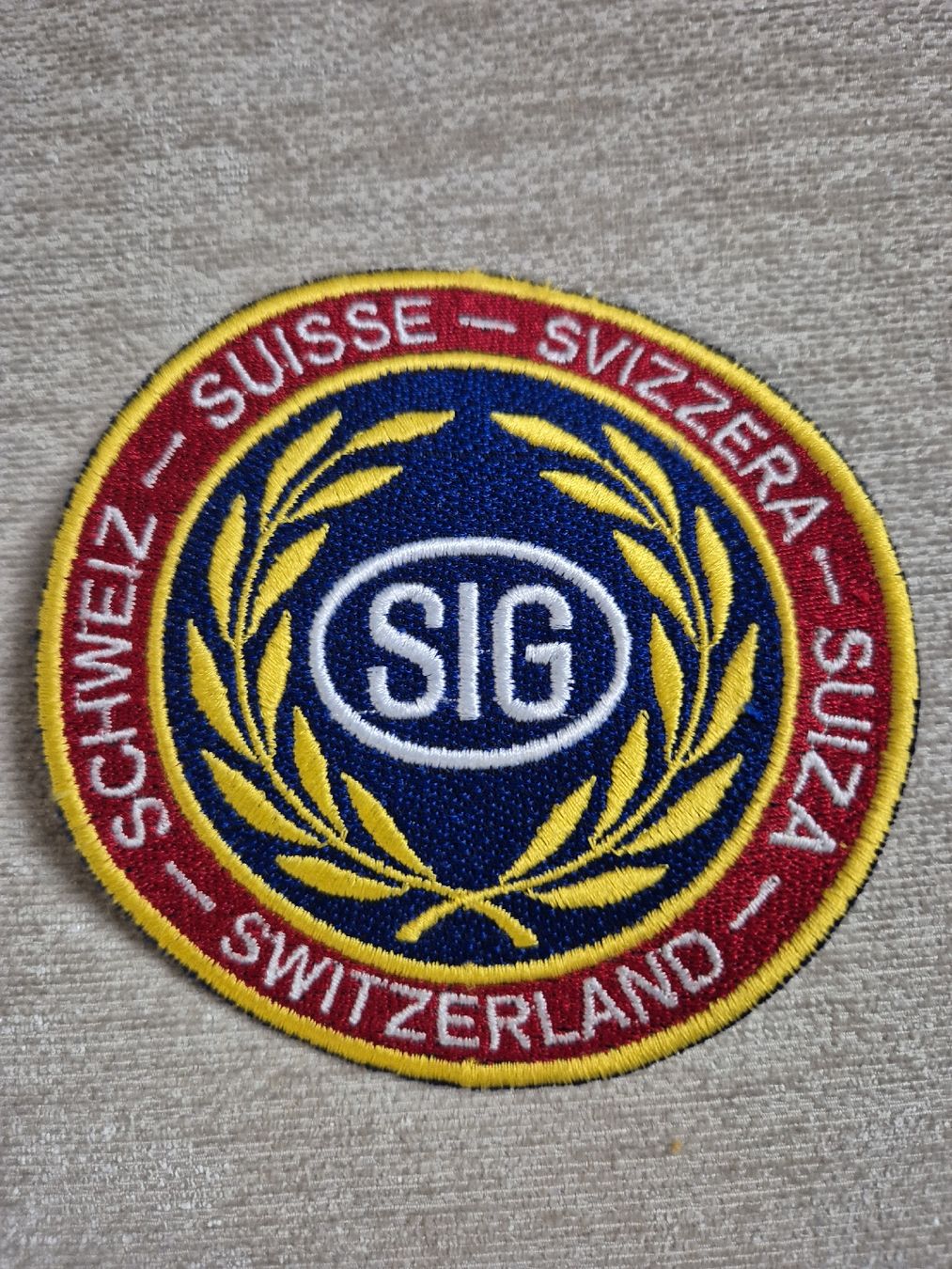 Sig Sauer Toppe: SIG Stoffpatch Gestickt, 4- farbig, Ø100mm – Nuovo (secondo la descrizione) da Fehraltorf venduto da Joggel3