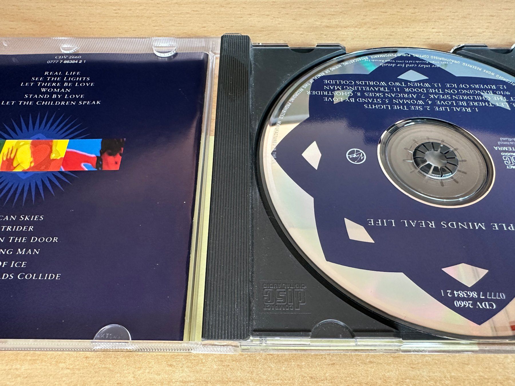 CDs: Simple Minds – Real Life – Gebraucht aus Rikon im Tösstal von Alpenmutz 2