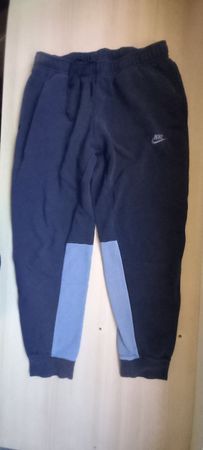 Pantalon Nike gris et bleu taille L bon état