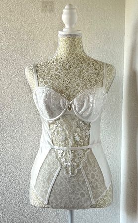White lace corset body with adjustable straps and bow detail