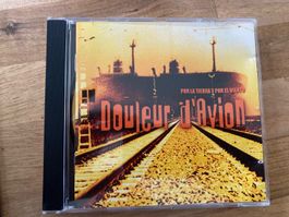 DOULEUR D'AVION "por la tierra y por le viento"
