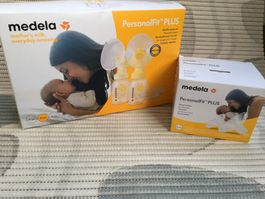 Medela Doppelpumpset und Brusthauben 24 und 27 mm