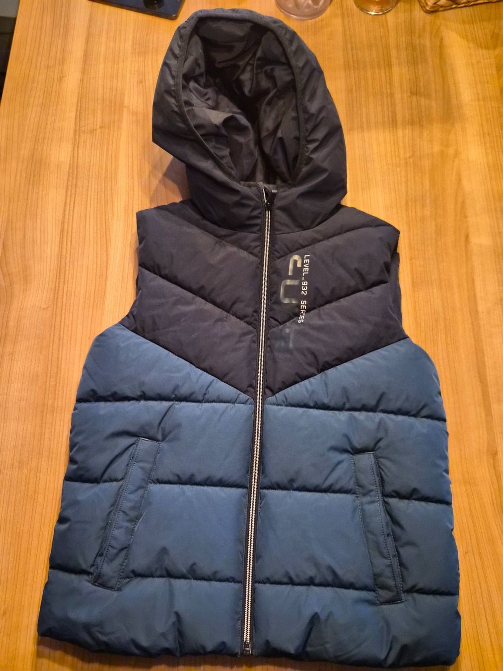 Altro abbigliamento per bambino: Kinder Daunen Gilet Gr. 152 – Usato da Schötz venduto da Nico040