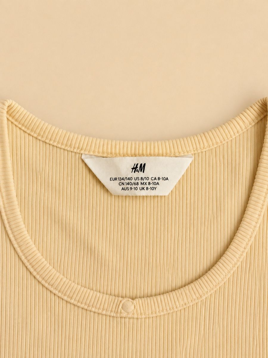 H&M Blusen, T-Shirts & Tops: TOP CÔTELÉ JAUNE PÂLE H&M – Neu (gemäss Beschreibung) aus Lausanne von mar_6snp 2