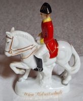 Porzellanfigur Pferd mit Reiter L.11cm. / H 14 cm.