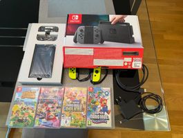 Nintendo Switch 32Gb mit 2 Zusatzkontroller und 4 Spiele