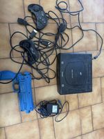 Console Sega Saturn avec accessoires et manettes