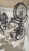 2 Bici da città , nera da riparare