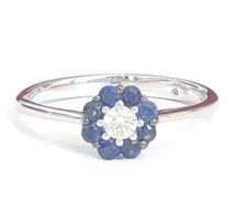 Cocktailring: 8 Saphire 0.26ct., 1 Diamant 0.10ct., 1190.-