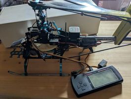 Hélico T-Rex 450, année 2010, avec beaucoup de pièces.