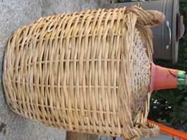 Bonbonne dame jeanne en osier vintage 25 litres.
