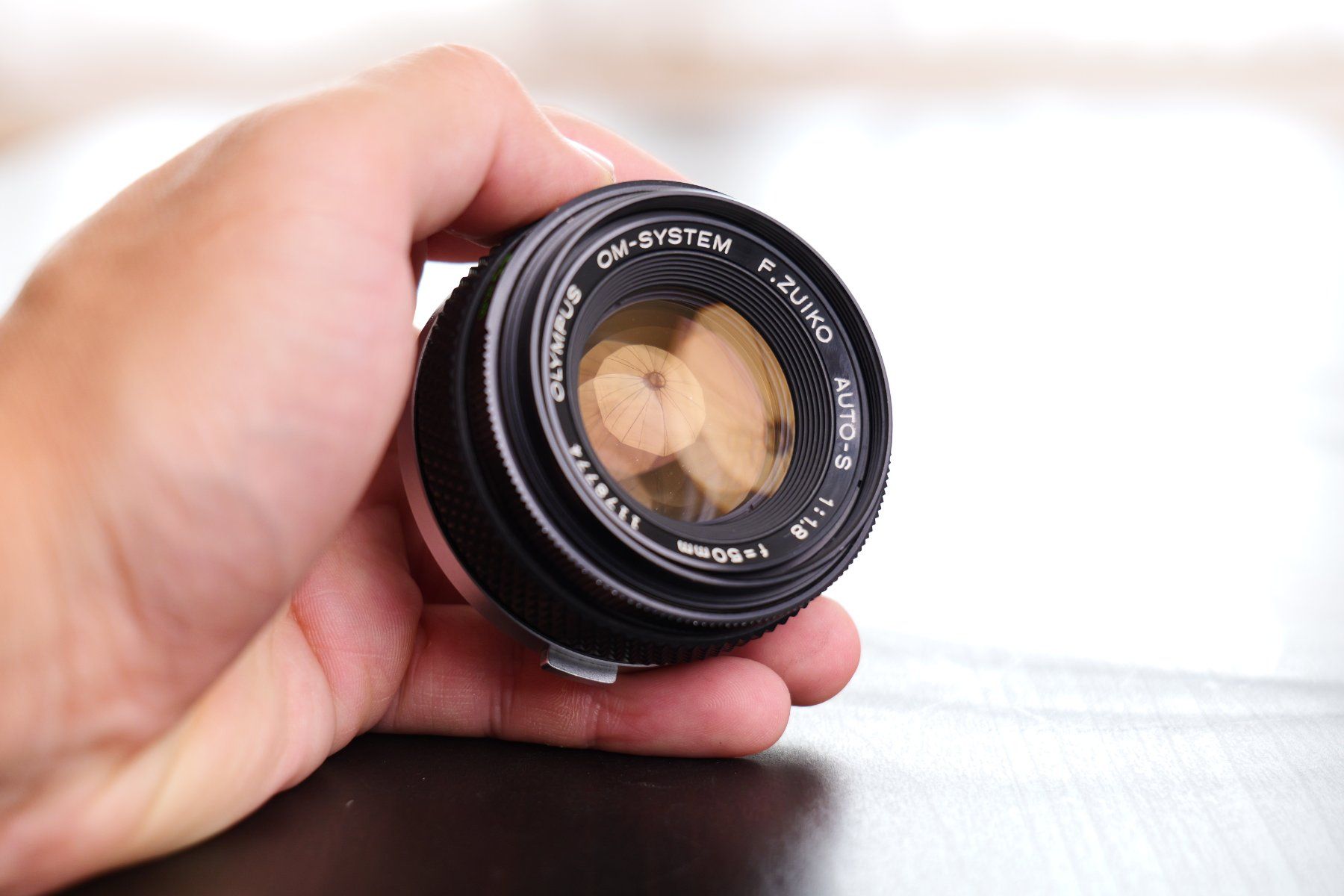 Olympus Obiettivi: Olympus OM Zuiko 50mm f1.8 – Usato da Tecknau venduto da LevinLaufmann 6