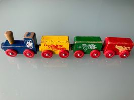Zugkomposition mit Koboldzeichnungen für Spielzeugeisenbahn