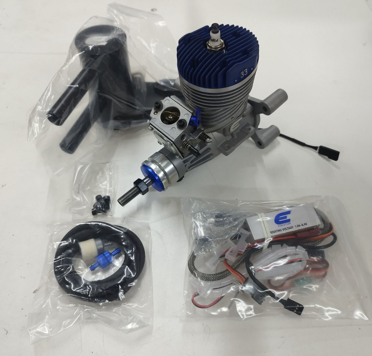 Modellismo RC: Neu Evolution 33ccm – Nuovo e nell'imballaggio originale da Kestenholz venduto da Modellbaukeller