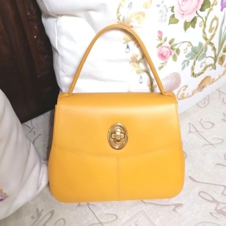 Christian Dior handbag yellow gold never used